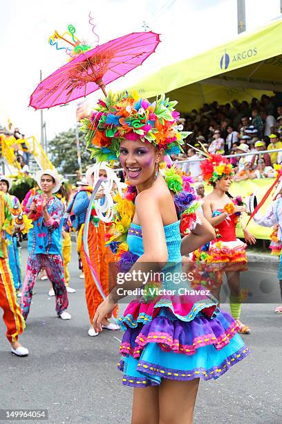 Dancer woman takes part in the traditional 55th Desfile de Silleteros during the Feria De Flores 2012 at Guayaquil Bridge on August 7, 2012 in...