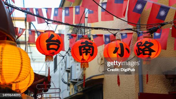 tainan alley, roc flags and red lanterns - yokohama chinatown bildbanksfoton och bilder