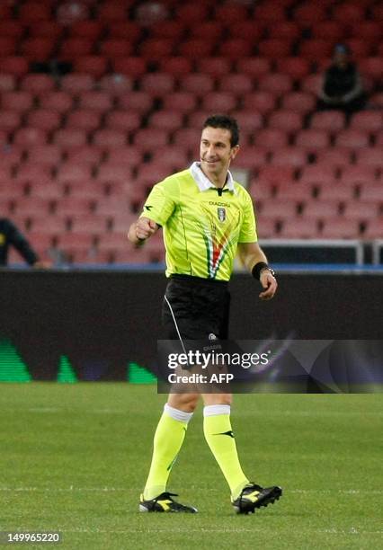 Italian referee Daniele Doveri comes back after a freak injury before the Italian Serie A football match between SSC Napoli and Novara Calcio in San...