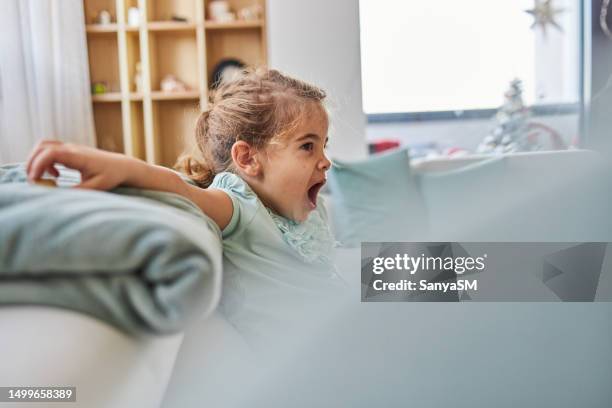 small girl with chickenpox - yawning is contagious stock pictures, royalty-free photos & images