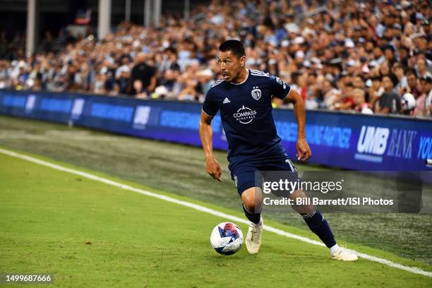 Roger Espinoza of Sporting Kansas City with the ball during a game between Los Angeles FC and Sporting Kansas City at Children's Mercy Park on June...