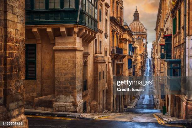 street view and basilica of our lady of mount carmel in valletta - maltese islands stockfoto's en -beelden