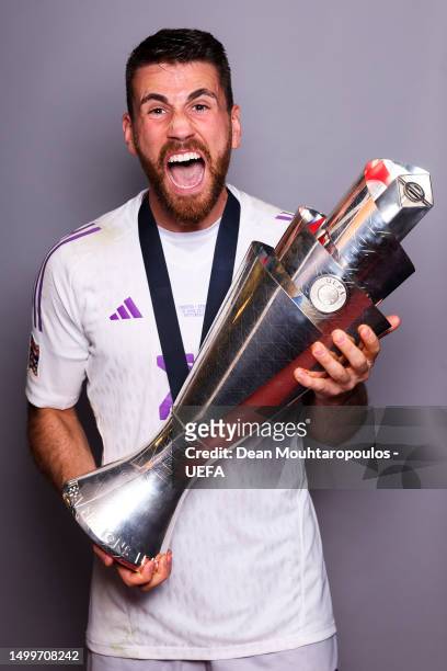 Unai Simon of Spain poses for a photograph with the UEFA Nations League Trophy during the UEFA Nations League 2022/23 at De Kuip on June 18, 2023 in...