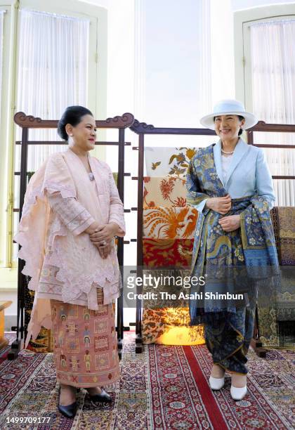 Empress Masako wearing a batik clothes with Iriana Joko Widodo on June 19, 2023 in Bogor, Indonesia.