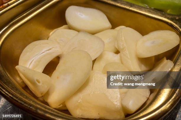 sliced garlic - relish stock pictures, royalty-free photos & images