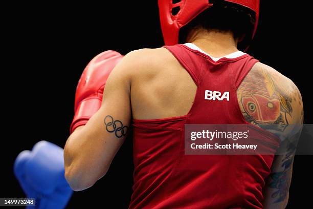 Tattoos of Adriana Araujo of Brazil are displayed during the Women's Light Boxing semifinals on Day 12 of the London 2012 Olympic Games at ExCeL on...