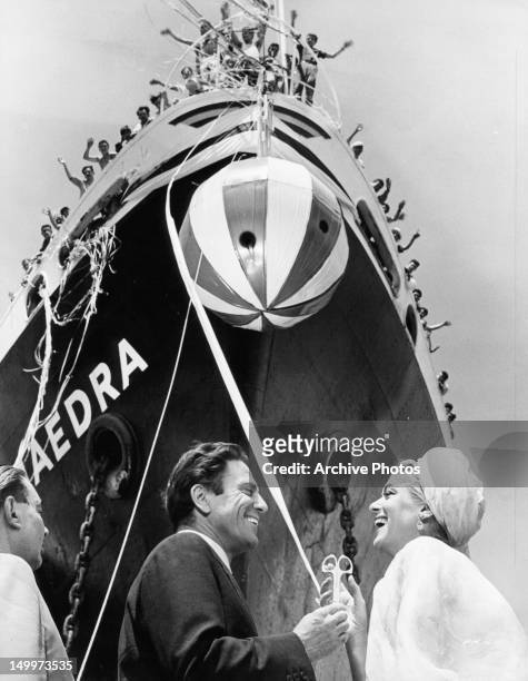Raf Vallone and Melina Mercouri at ribbon cutting event for ship in a scene from the film 'Phaedra', 1962.