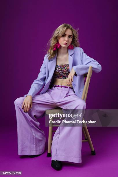 beautiful woman wearing purple suit - sudbury stock pictures, royalty-free photos & images