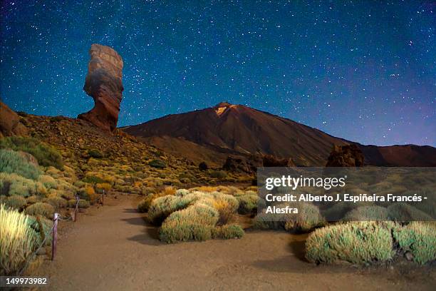 peak of rocky mountains - el teide national park stock pictures, royalty-free photos & images