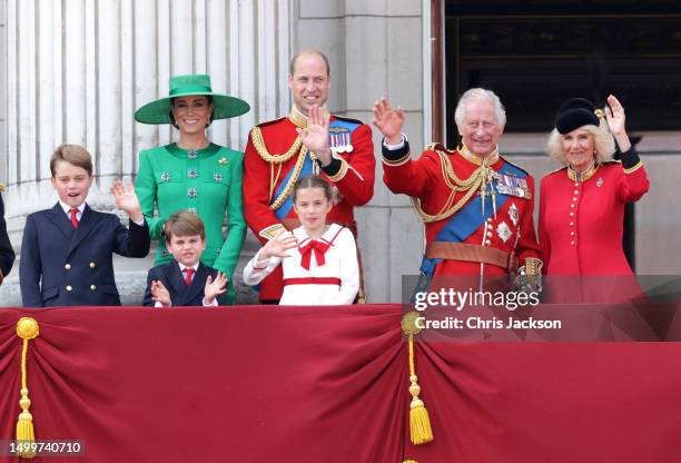 King Charles III and Queen Camilla wave alongside Prince William, Prince of Wales, Prince Louis of Wales, Catherine, Princess of Wales and Prince...