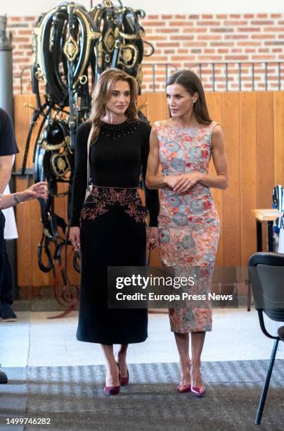 Queen Letizia and Her Majesty Queen Rania of Jordan during their visit to the Patrimonio Nacional workshop schools and employment workshops, at the...