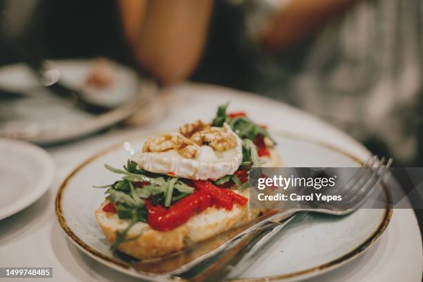 healthy breakfast sits in a table.letucce and cheese toast - queso de cabra fotografías e imágenes de stock