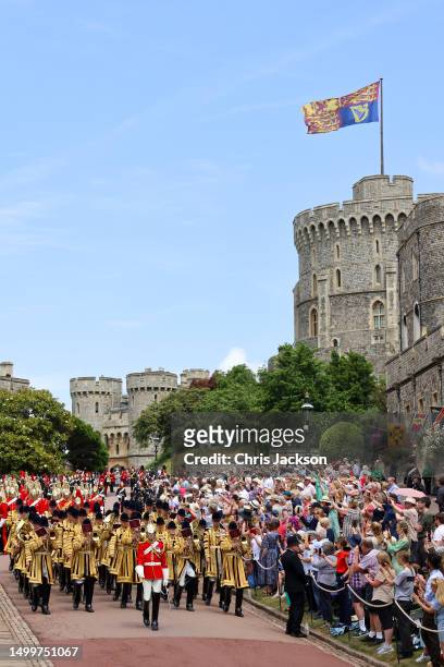 The Band of the Household Cavalry play as well-wishers look on ahead of the Order Of The Garter Service at Windsor Castle on June 19, 2023 in...