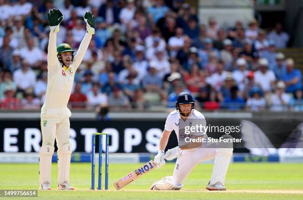 Wicketkeeper Alex Carey of Australia successfully appeals for the LBW of Jonny Bairstow of England from the bowling of team mate Nathan Lyon during...