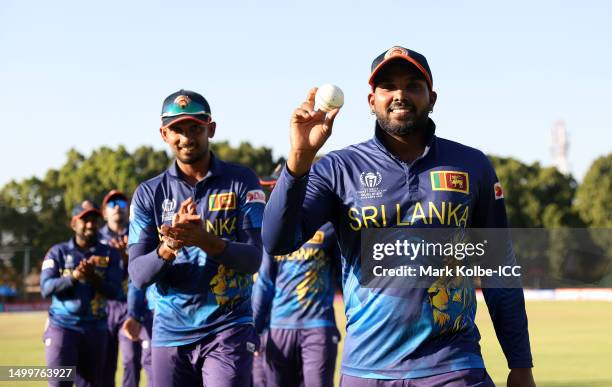 Wanindu Hasaranga of Sri Lanka makes their way off after take 6-24 during the ICC Men's Cricket World Cup Qualifier Zimbabwe 2023 match between Sri...