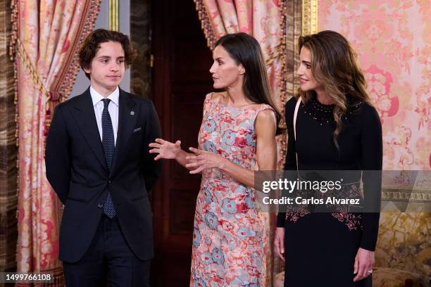 Prince Hashem of Jordan, Queen Letizia of Spain and Queen Rania of Jordan pose for the photographers before a lunch at the Royal Palace on June 19,...