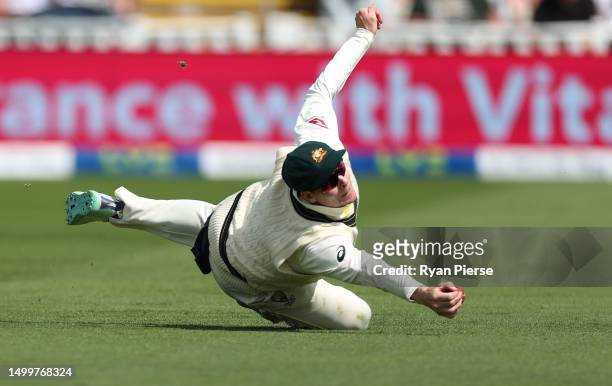 Steve Smith of Australia attempts unsuccessfully to catch Stuart Broad of England during Day Four of the LV= Insurance Ashes 1st Test match between...