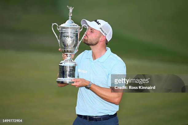 Wyndham Clark of the United States poses with the trophy after winning the 123rd U.S. Open Championship at The Los Angeles Country Club on June 18,...