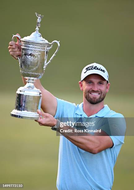 Wyndham Clark of the United States poses with the trophy after winning the 123rd U.S. Open Championship at The Los Angeles Country Club on June 18,...