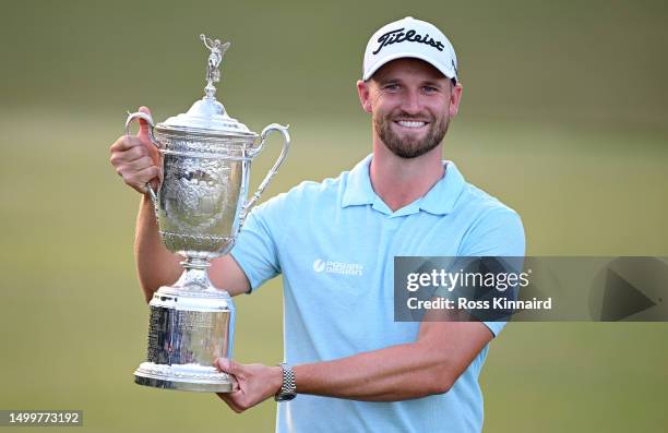 Wyndham Clark of the United States poses with the trophy after winning the 123rd U.S. Open Championship at The Los Angeles Country Club on June 18,...