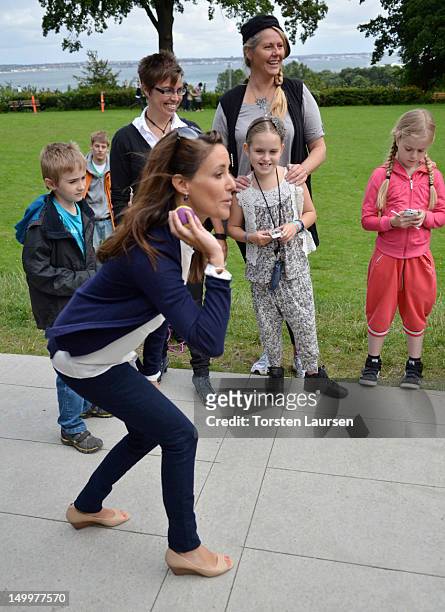 Princess Marie of Denmark visits the National Association Autism Elsinore Holiday Village on August 8, 2012 in Helsingor, Denmark.