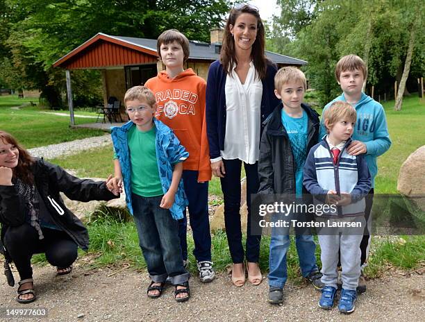 Princess Marie of Denmark visits the National Association Autism Elsinore Holiday Village on August 8, 2012 in Helsingor, Denmark.