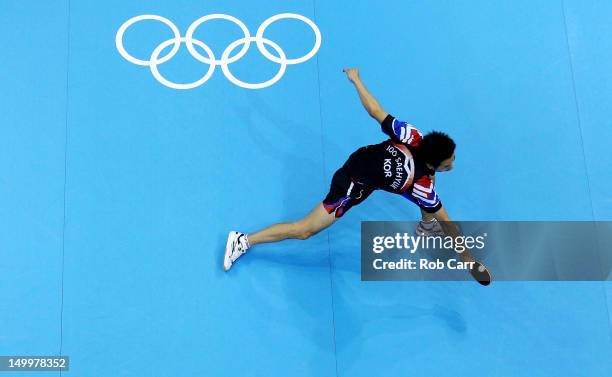 Saehyuk Joo of Korea competes against Zhang Jike of China during the Men's Team Table Tennis gold medal match on Day 12 of the London 2012 Olympic...