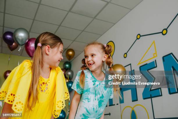 school kids in the class - back to school party stock pictures, royalty-free photos & images