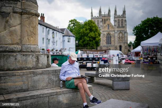 Shoppers goi about their daily chores in Selby market place on June 19, 2023 in Selby, England. Last week, the MP for Selby and Ainsty, Nigel Adams,...