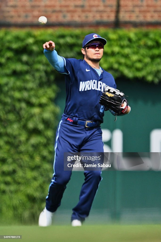 Seiya Suzuki Of The Chicago Cubs Throws From The Outfield Against The