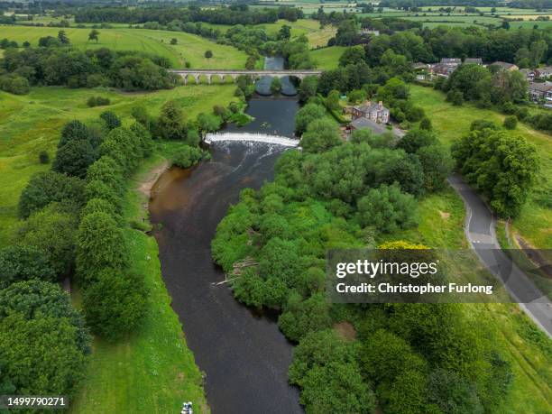 An aerial view of the River Wharfe meandering through Tadcaster in the rural constituency of Selby and Ainsty on June 19, 2023 in Tadcaster, England....