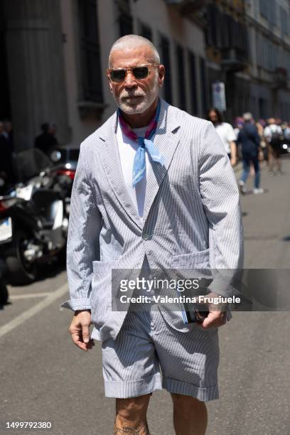 Nick Wooster is seen wearing a short striped pant suit outside Giorgio Armani show during the Milan Fashion Week - Menswear Spring/Summer 2024 on...