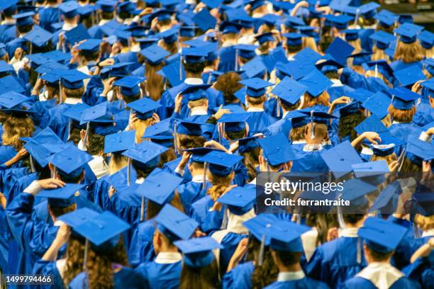 student audience at graduation ceremony - cap hat stock pictures, royalty-free photos & images