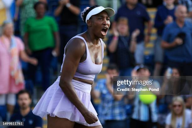 Venus Williams of United States celebrates winning match point against Camila Giorgi of Italy in the Women's First Round match during Day Three of...