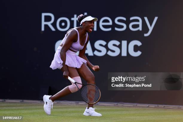Venus Williams of United States celebrates winning match point against Camila Giorgi of Italy in the Women's First Round match during Day Three of...