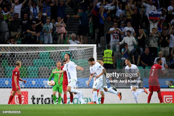Andraz Sporar of Slovenia celebrates after scoring the team's first goal during the UEFA EURO 2024 qualifying round group D match between Slovenia...