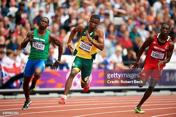 Summer Olympics: Sierra Leone Ibrahim Turay, South Africa Anaso Jobodwana and Trinidad & Tobago Rondel Sorrillo in action during Men's 200M Round 1...