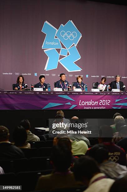 Yuki Ogimi, Miho Fukumoto, coach Norio Sasaki and captain Aya Miyama of the Japan Women's football team face the media during a press conference...