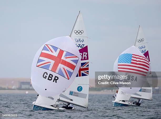 Hannah Mills and Saskia Clark of Great Britain and Amanda Clark and Sarah Lihan of the United States compete in the 470 Women's Class Sailing on Day...