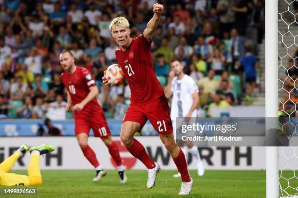 Rasmus Hojlund of Denmark celebrates after scoring the team's first goal during the UEFA EURO 2024 qualifying round group D match between Slovenia...