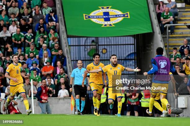 Abat Aymbetov of Kazakhstan celebrates after scoring the team's first goal during the UEFA EURO 2024 qualifying round group D match between Northern...