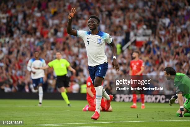 Bukayo Saka of England celebrates after scoring the team's fifth goal and his third during the UEFA EURO 2024 qualifying round group C match between...