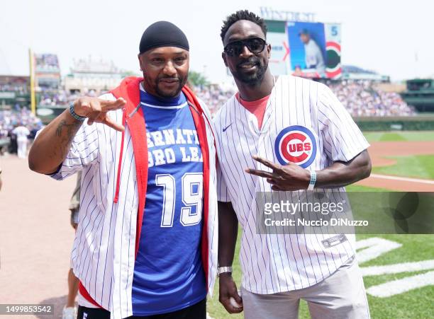 Grammy-nominated producer and poet Malik Yusef and retired Chicago Bears cornerback Charles Tillman, nicknamed “Peanut” throw the ceremonial first...