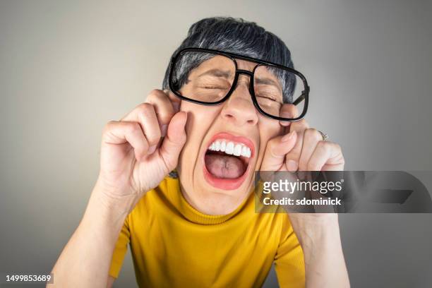 funny fisheye nerdy woman having an ugly cry - ugly people crying stock pictures, royalty-free photos & images