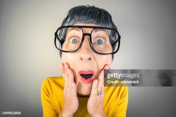 funny fisheye nerdy woman pleasantly surprised - thick white women stock pictures, royalty-free photos & images