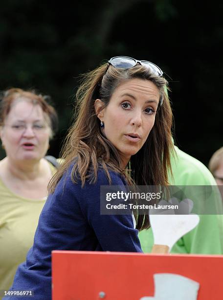 Princess Marie of Denmark visits the National Association Autism Elsinore Holiday Village on August 8, 2012 in Helsingor, Denmark.