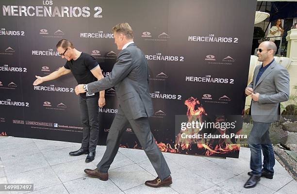 Jason Statham, Dolph Lundgren and Jean-Claude Van Damme attend 'The Expendables 2' photocall at Ritz hotel on August 8, 2012 in Madrid, Spain.