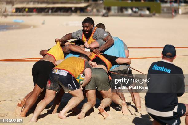 Wallabies players take part in a drill during an Australian Wallabies training session at Coogee Beach on June 20, 2023 in Sydney, Australia.