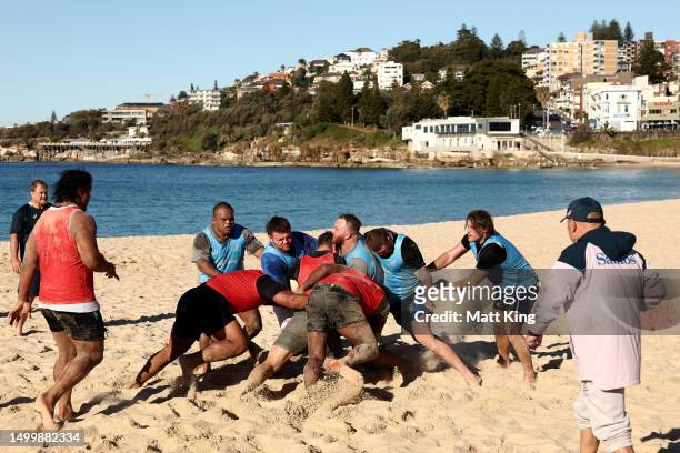 Wallabies players take part in a drill during an Australian Wallabies training session at Coogee Beach on June 20, 2023 in Sydney, Australia.