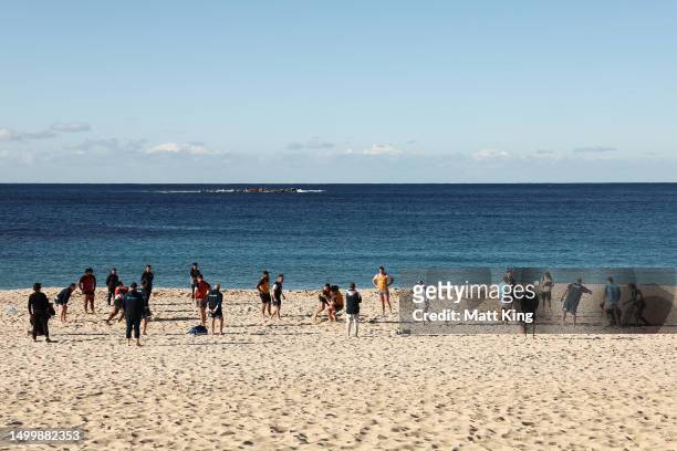 Wallabies players take part in a drill during an Australian Wallabies training session at Coogee Beach on June 20, 2023 in Sydney, Australia.